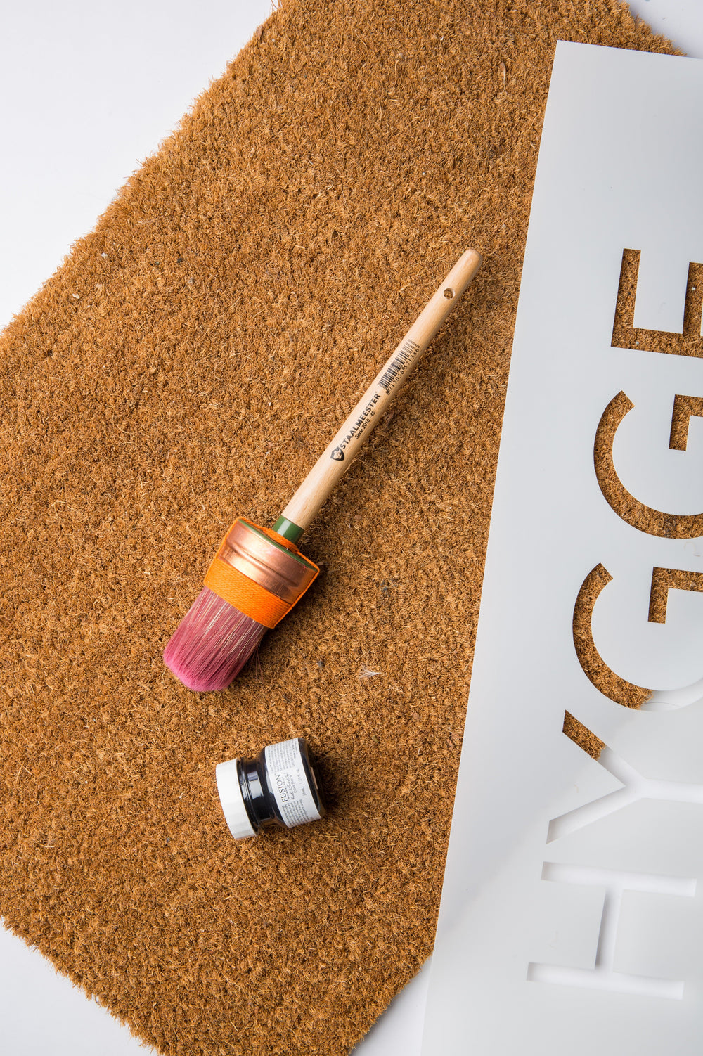 How to stencil an IKEA doormat and a DIY doormat round up!