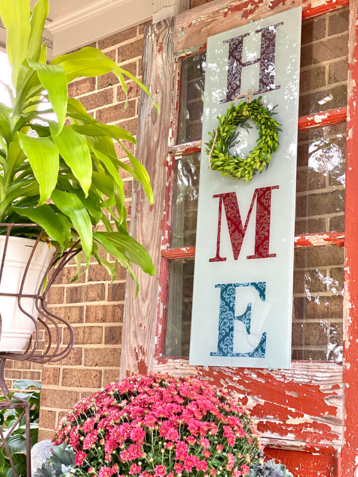 Stencil And Paint An All-Season Glass Home Sign