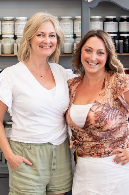 Jennylyn Pringle standing with a member of the Fusion Mineral Paint family