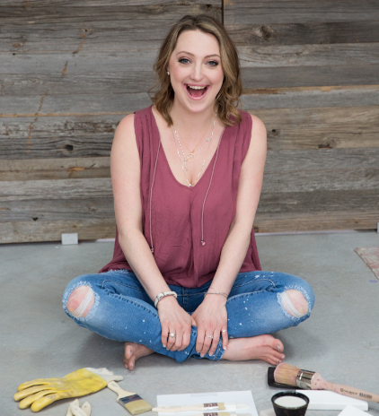 Jennylyn sitting with painting tools
