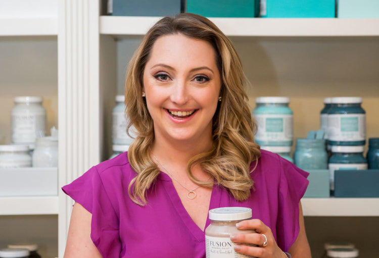 Jennylyn holding a jar of Fusion Mineral Paint